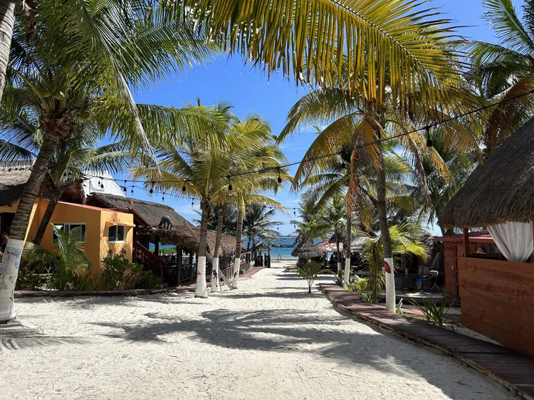 Full panoramic view of the beach and lounge section at Squalo Beach Club